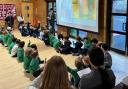 Older student Ewan delivers an assembly to pre-prep children at St Anthony's