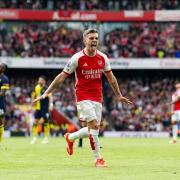 Arsenal's Leandro Trossard celebrates scoring their side's second goal of the game during the Premier League match at the Emirates Stadium, London. Picture date: Saturday May 4, 2024.