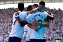 Tottenham Hotspur's Ryan Sessegnon celebrates with team-mates after scoring their first goal against Southampton