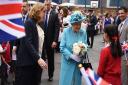 The Queen and Prince Philip on their tour of Mayflower School in Poplar, London.