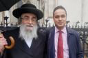 Asher Gratt and Abdul Hai outside the Royal Courts of Justice after the judgement