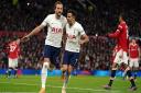 Tottenham Hotspur's Harry Kane (left) celebrates with Sergio Reguilon after scoring from the penalty spot at Old Trafford