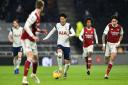Tottenham Hotspur's Son Heung-min runs at the Arsenal defence