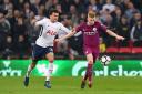Tottenham Hotspur's Dele Alli (left) and Manchester City's Kevin De Bruyne battle for the ball during the Premier League match at Wembley Stadium (pic: Dominic Lipinski/PA Images).