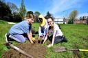 Power Up North London's 2021 community fund included planting trees and a wildflower meadow with pupils from Parliament Hill School, with each tree named after an inspirational woman. Pictured from left: Alice Rochetti, Hani Ali and Helena Albright