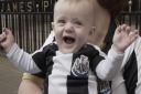 A still from We Are The Geordies documentary Baby Bobby celebrating