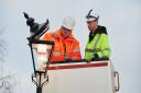 Cllr Adam Harrison, on the right, inspecting the replacement of streetlights with LED lamps on Downshire Hill, Hampstead. On the left is Geoff Moore, an electrician with Enerveo, the company undertaking the works on behalf of Camden Council