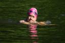 A swimmer in the Hampstead Heath mixed bathing pond in July. Picture: Aaron Chown/PA