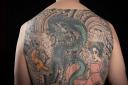 Nick Hurst's tattoo is based in Japanese woodblock prints which feature in his book picture by Anna Gordon