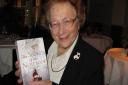 Eve Haas with her book, taken in 2009. Picture: Timothy Haas