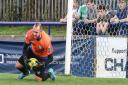 Wingate & Finchley goalkeeper Shane Gore claims the ball (pic: Martin Addison).