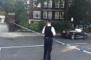 A police cordon around the block of flats in Eton College Road.   picture: Emily Banks.