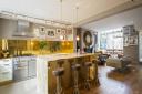 Jo Berryman's Carmela Soprano-inspired gold kitchen