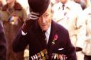 John Davis wearing replicas of his and his father's medals at the AJEX parade in 2001