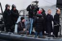 Rory Kinnear and Daniel Craig stand at the front of a speedboat on the  canal in Camden, as they film scenes for the new Bond film Spectre.