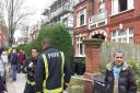 Firefighters at the scene of the fire in Broadhurst Gardens this morning