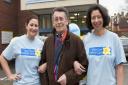 Robert Powell opens the Winter Fair at Marie Curie Hospice in Hampstead with Natasha Evans and Alyson Walsh. Picture: Nigel Sutton.