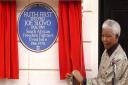 Nelson Mandela unveiled the blue plaque at 13 Lime Street, Camden Town, where Joe Slovo and his wife Ruth First lived between 1966 and 1978. Picture: PA/Kirsty Wigglesworth