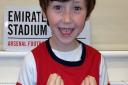Seven-year-old Harvey won the competition after sending this photo to the Gunners