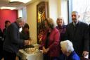 Holocaust survivors light candles in remembrance at the Holocaust Survivors' Centre in Golders Green