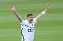 Middlesex's Tom Helm took both Surrey wickets to fall