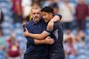 Tottenham boss Ange Postecoglou and Son Heung-min celebrate