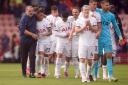 Ange Postecoglou and Tottenham players celebrate at Bournemouth