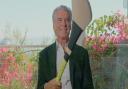 Pierce Brosnan with his Hurling Stick while filming Quintessentially Irish