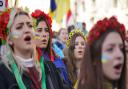 Women take part in a demonstration in Whitehall against the Russian invasion of Ukraine