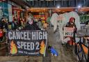 Protesters against HS2 at Euston station with banners and a prop elephant called Nelly, January 24
