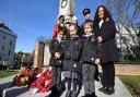 Camden Cllr Sabrina Francis, speaker Anthea Ionides, Chf insp Richard Berns and service leader Rev Kate Dean with reception pupils from Hampstead Hill School Zacharus Khan, Ellie Taylor and Arnold Schipka at the Interfaith Remembrance service at the