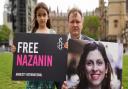 Richard Ratcliffe and his daughter Gabriella holding signs in Parliament Square in September to mark the 2,000th day Nazanin Zaghari-Ratcliffe has been detained in Iran.