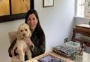 Artist Deborah Cornes with her dog Tito - who has been the inspiration behind a change in career