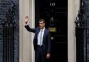 Rishi Sunak waves to the press before entering 10 Downing Street as the new prime minister (Picture: PA)