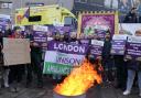 Ambulance workers on the picket line outside Waterloo ambulance station on December 21