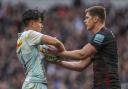 Marcus Smith and Owen Farrell battle for the ball