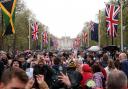Crowds flock down the Mall to see the newly crowned King and Queen (Image: PA)