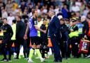 Tottenham's Harry Kane shakes hands with Leeds boss Sam Allardyce after their game