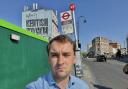Cllr James Slater next to the bus stop in Kentish Town which will be closed for two years