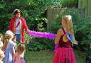 Pirate Nick and Mystical Fairy Michelina held a limbo dance at the Family Garden Party at Keats House Museum