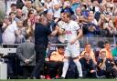 Harry Kane is congratulated by Ange Postecoglou after netting four goals in his last appearance