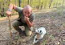 Teo the truffle hunter with his dog Bianchi and special tool for digging up the fungi. Image: Kerstin Rodgers