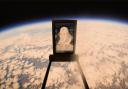 A portrait of William Shakespeare was sent into space on a weather balloon as part of celebrations to mark the 400th anniversary of the first printed edition of his collected plays.
