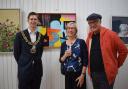 Haringey Mayor Cllr Lester Buxton with artists Jo Angell and Craig Barnard at the opening of the Crouch End Open Studios group show. Picture: Marie Mangan