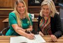 Newly elected Highgate ward councillor Lorna Russell signs the declaration of acceptance of office, watched by Camden Council chief executive Jenny Rowlands. Photo: Julia Gregory
