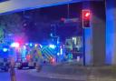 Emergency service vehicles with blue flashing lights were at the scene at Staples Corner late last night (April 14)