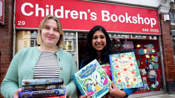 Ham & High: Aimee Gilbert and owner Sanchita Basu De Sakar outside of the Children's Bookshop in Muswell Hill as it reopened after the lockdown in 2021 Ham & High: Aimee Gilbert and owner Sanchita Basu De Sakar outside of the Children's Bookshop in Muswell Hill as it reopened after the lockdown in 2021