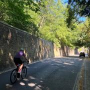 A cyclist taking on Swain's Lane, Highgate