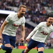 Tottenham Hotspur's Harry Kane and Heung-Min Son celebrate the first goal against Arsenal