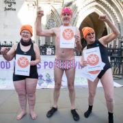 Pond swimmers (l-r) Mary Powell, Martin Fahey and Pauline Latchen protesting outside the Royal Court of Justice
